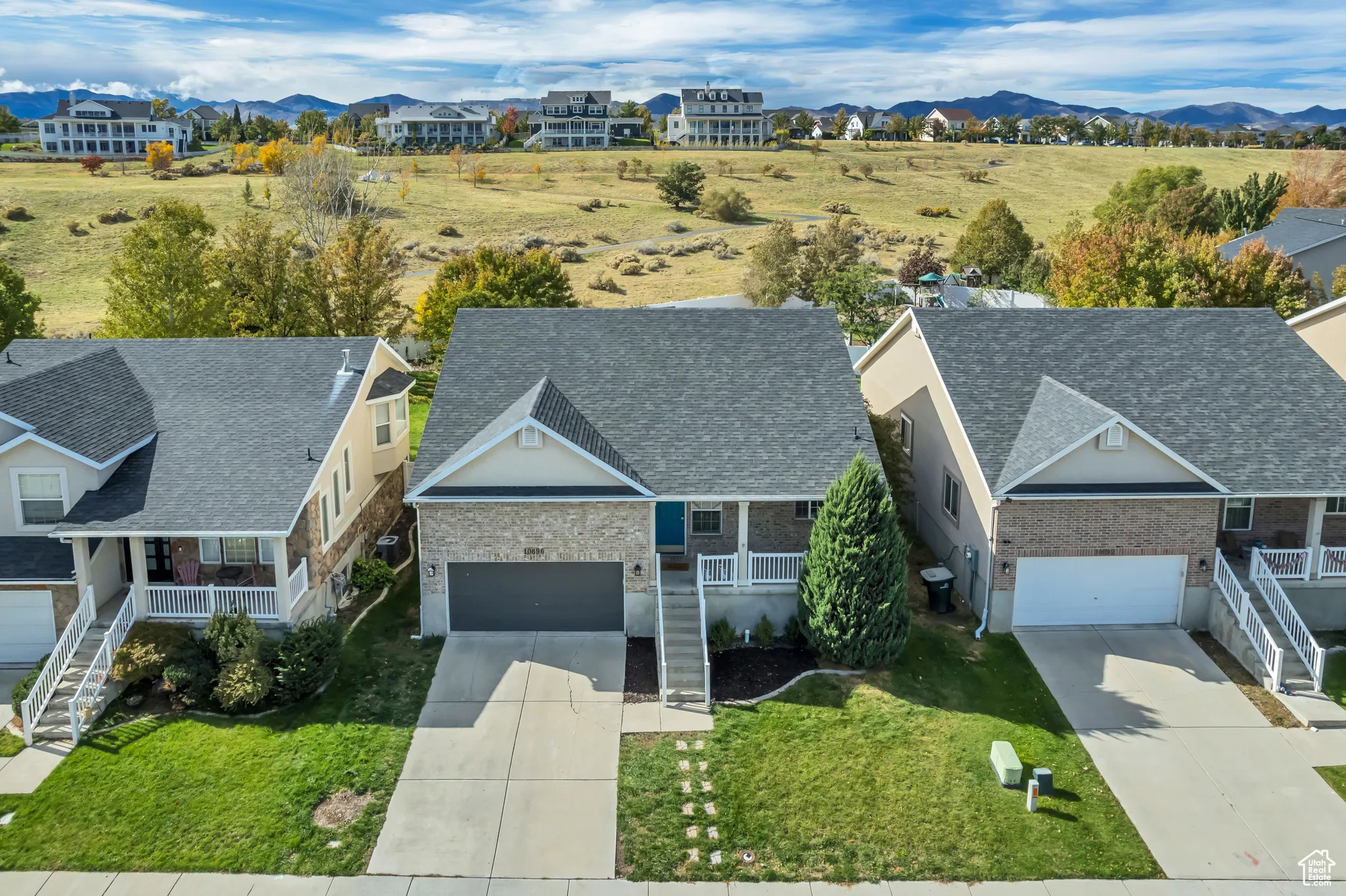 Aerial perspective of suburban area featuring mountains