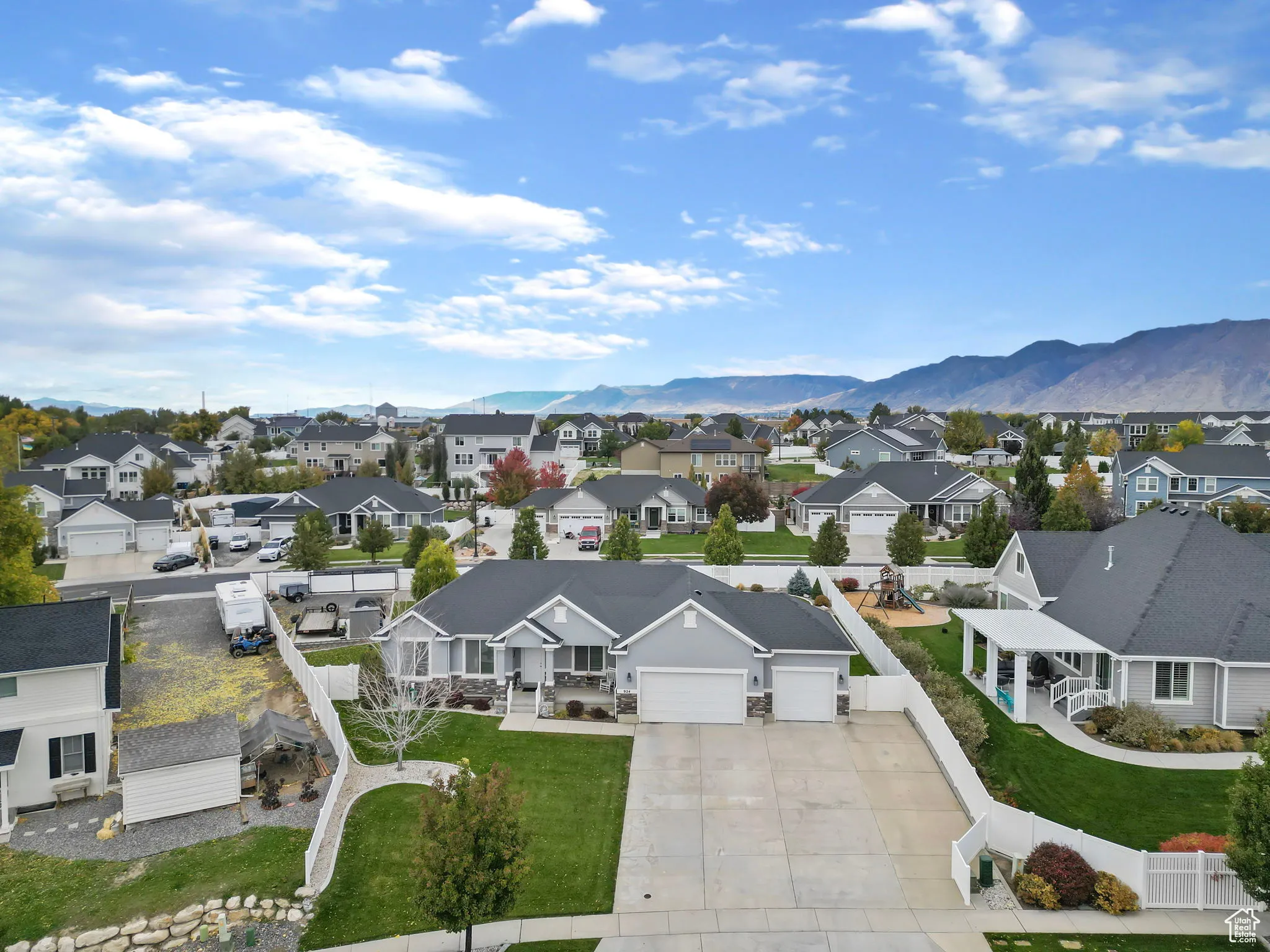 Aerial view of residential area with a mountainous background