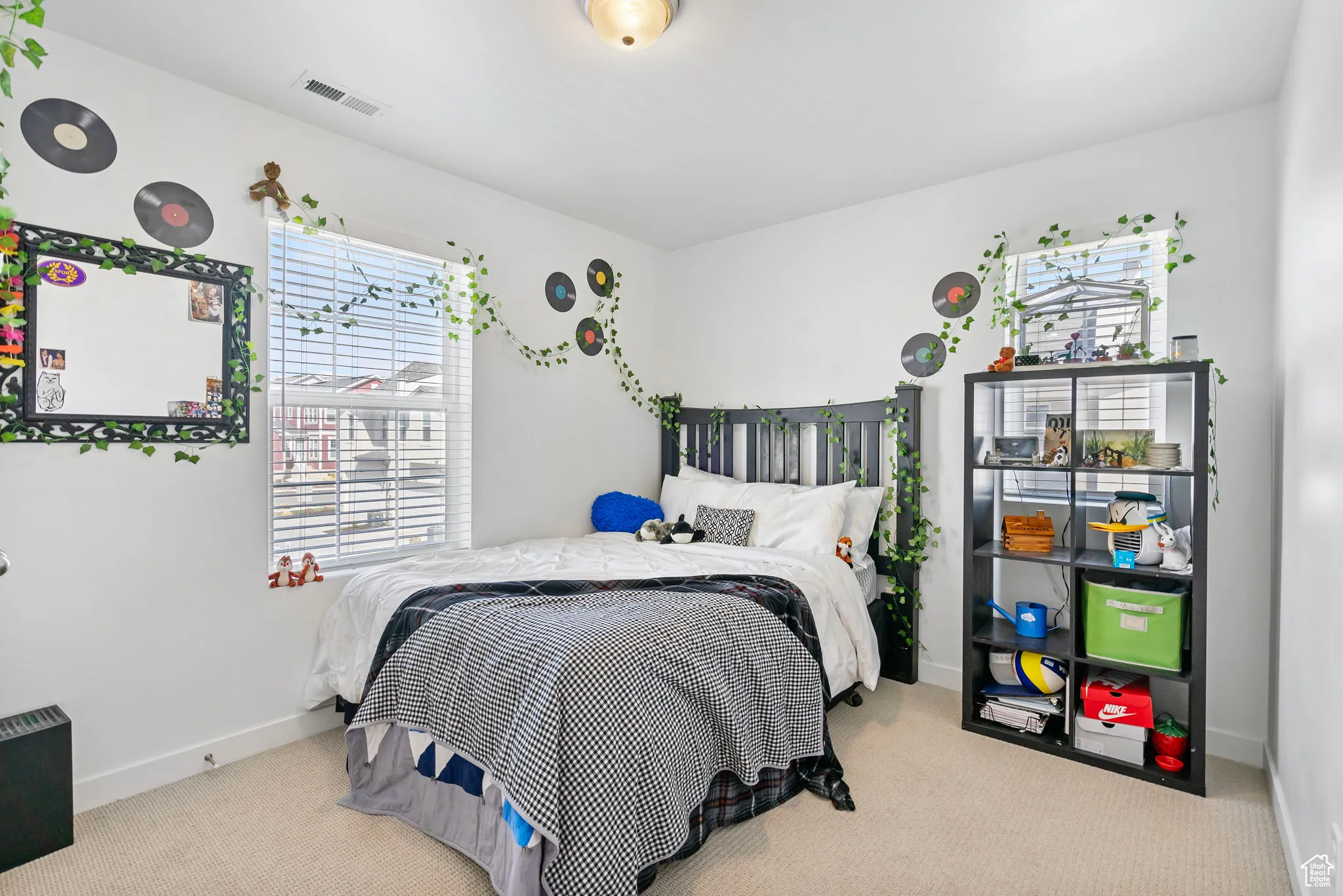 Carpeted bedroom featuring baseboards