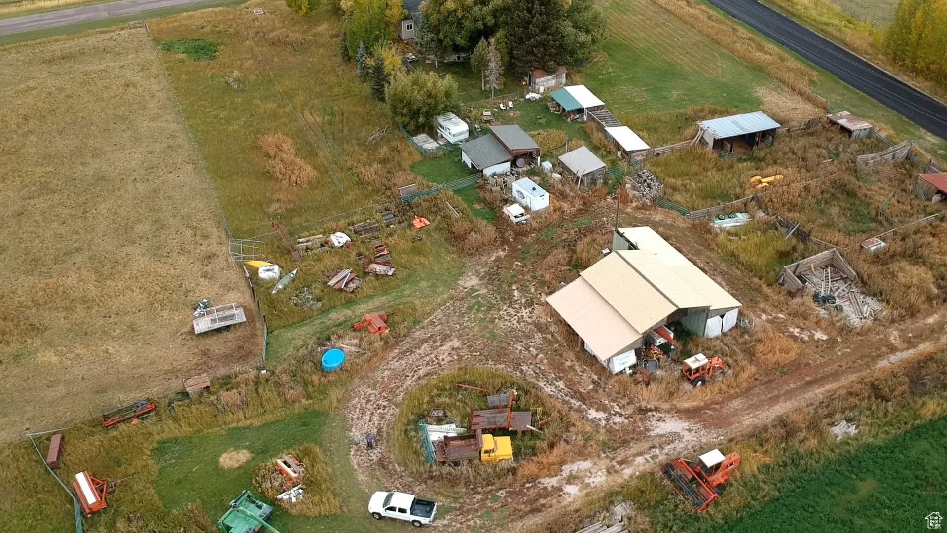 Aerial view of property and surrounding area with rural landscape and abundant farmland