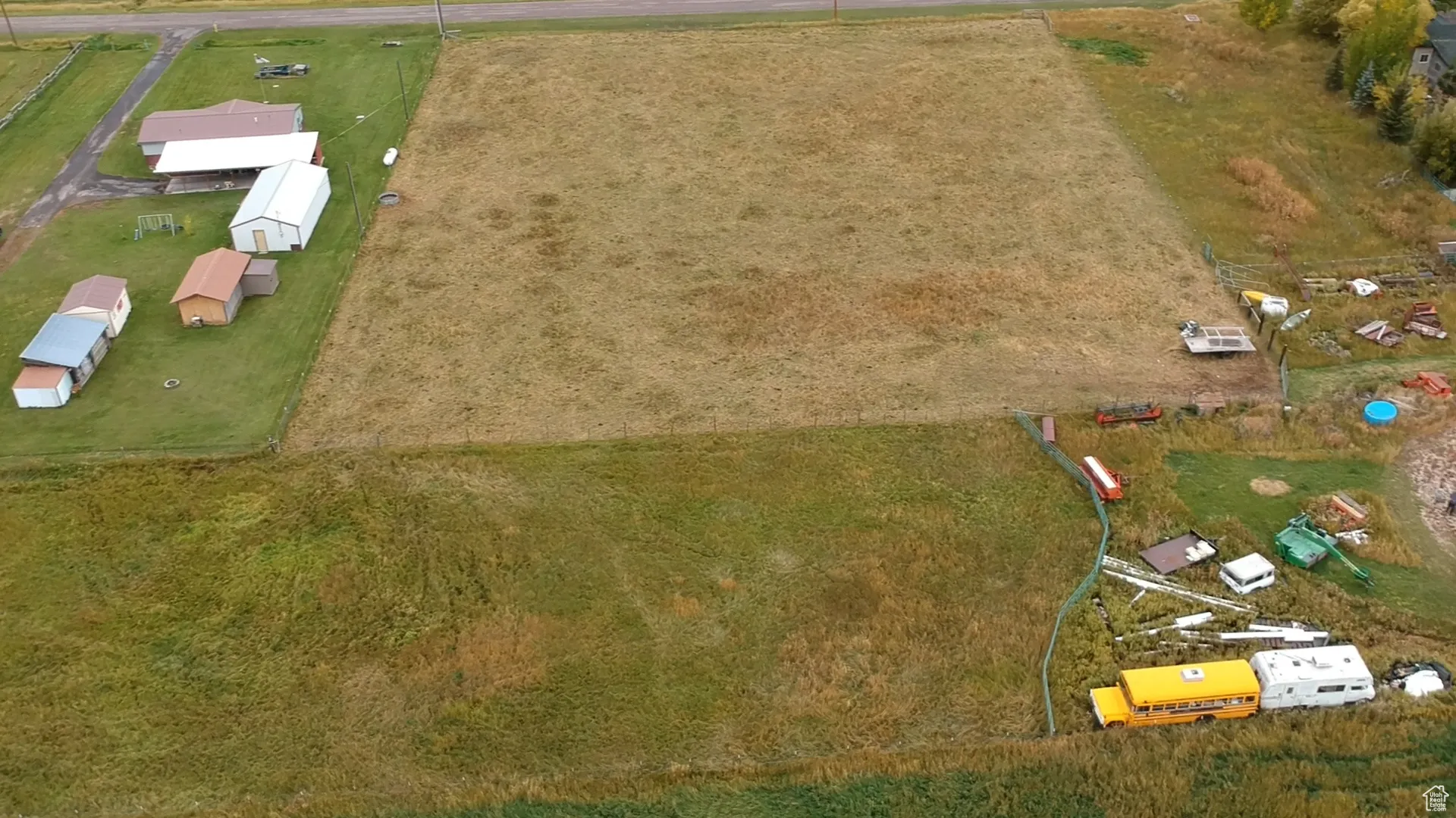 Aerial view of property and surrounding area with rural landscape
