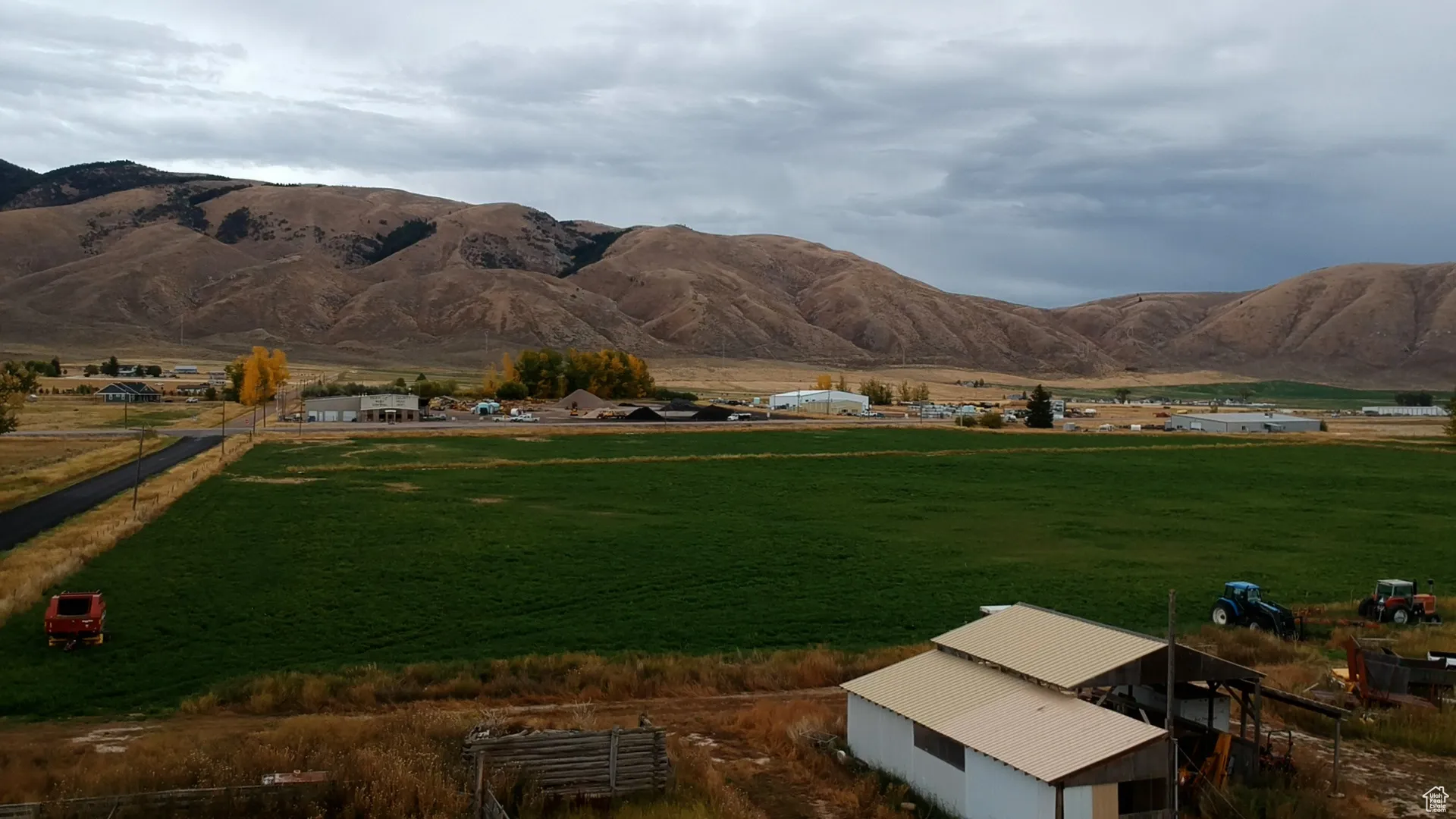 View of mountain background with rural landscape and a pastoral area
