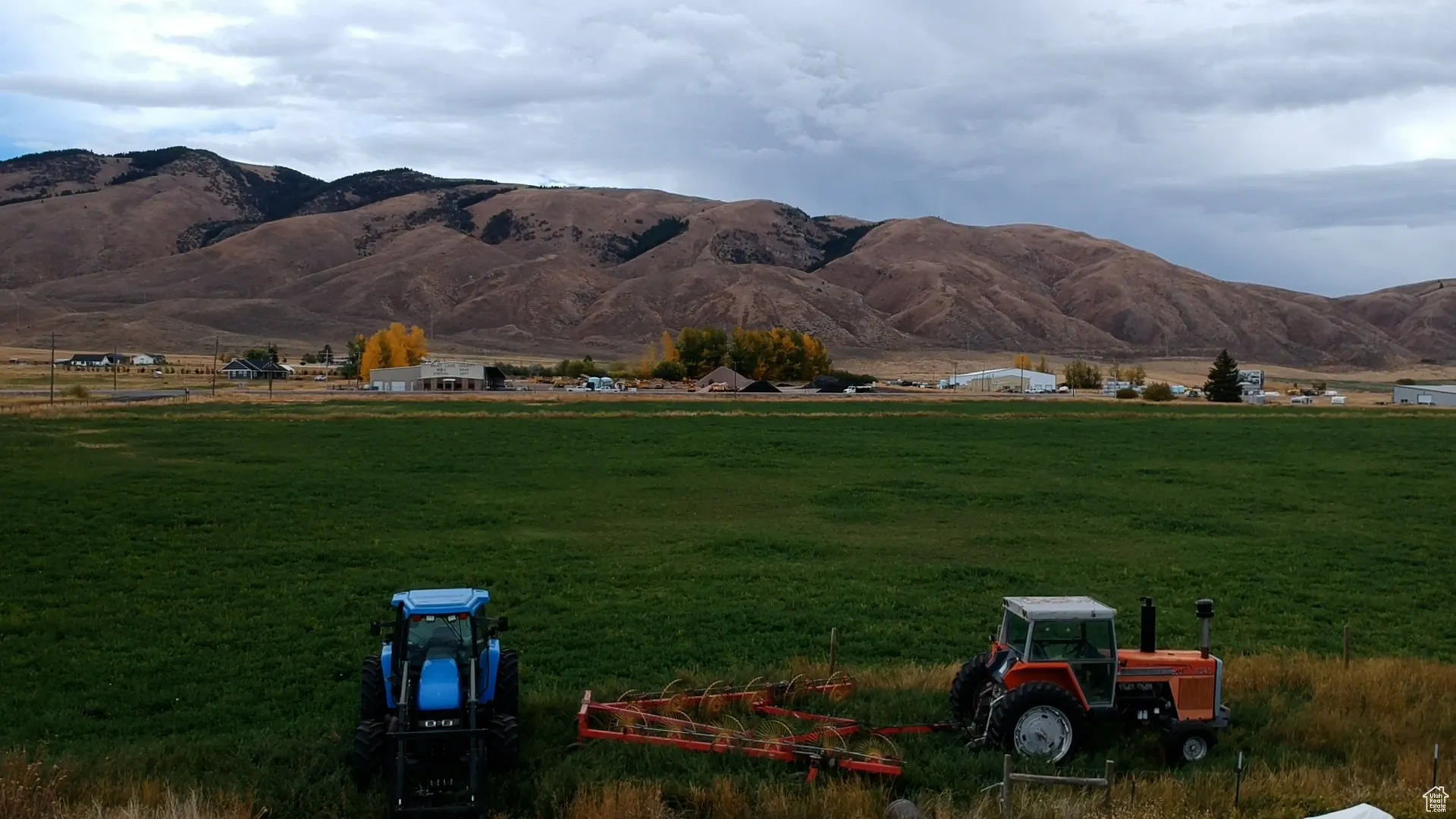 View of mountain backdrop featuring rural landscape