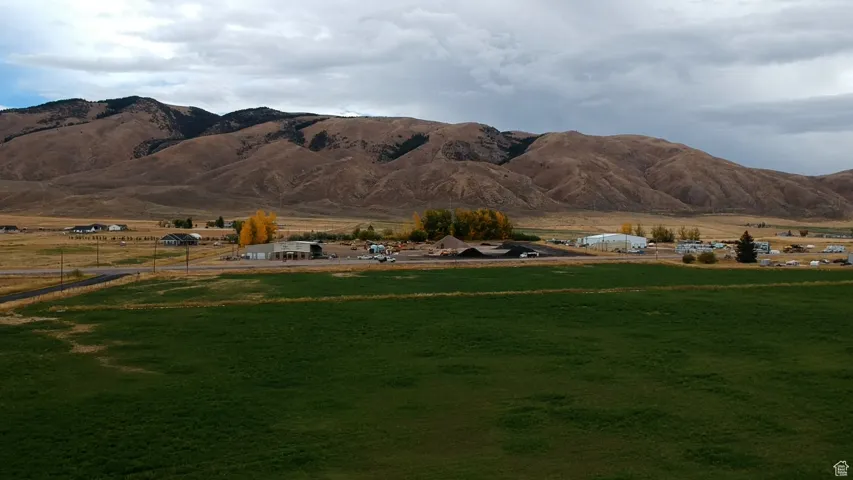 View of mountain background featuring rural landscape and a pastoral area