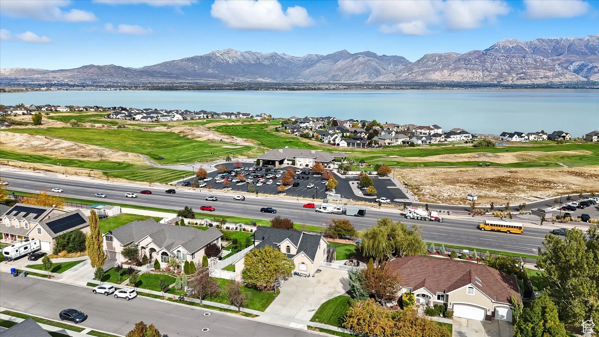 Aerial perspective of suburban area featuring a mountain backdrop