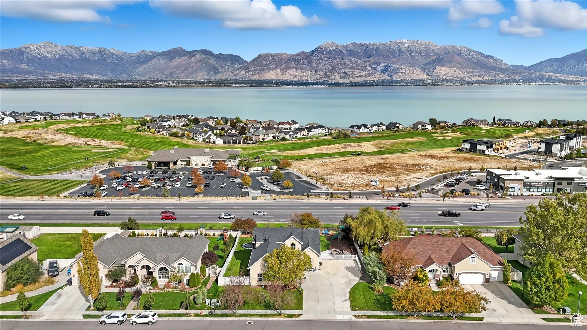 Aerial view of residential area featuring mountains