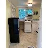 Kitchen featuring white range oven