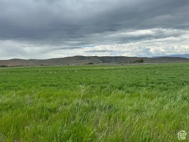 Mountain view with rural landscape and agricultural land