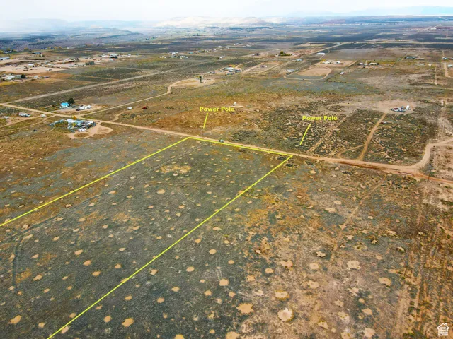 View of rural area featuring property boundaries highlighted and a mountainous background