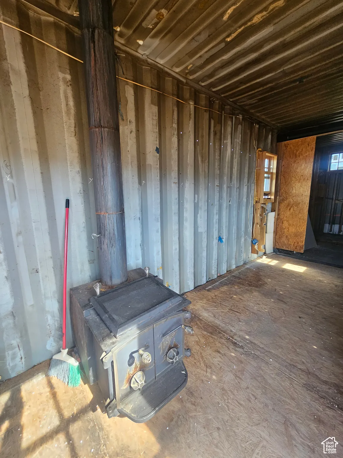 Interior of Storage Container with Wood burning stove!