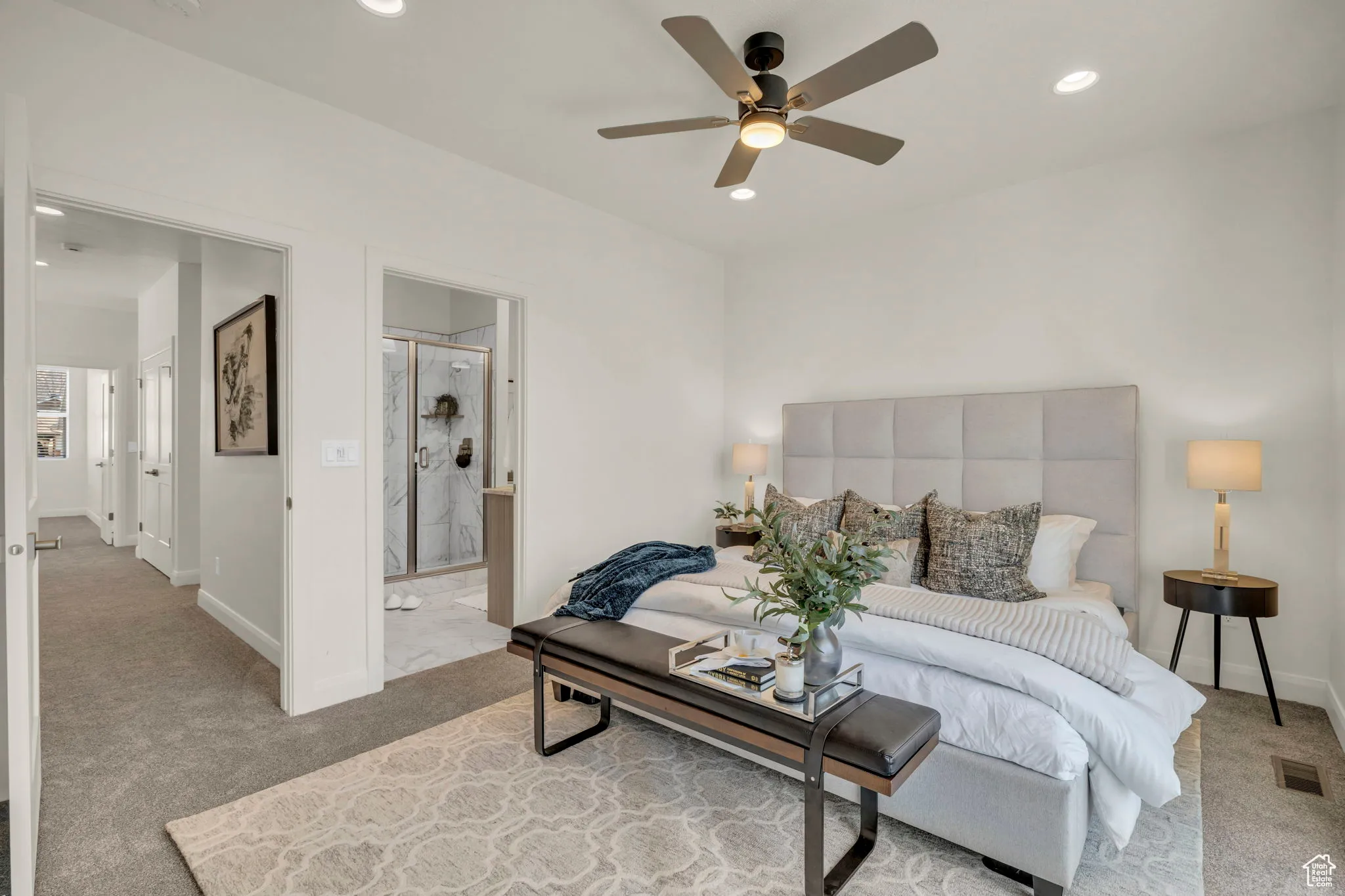 Living area with carpet floors, recessed lighting, and ceiling fan
