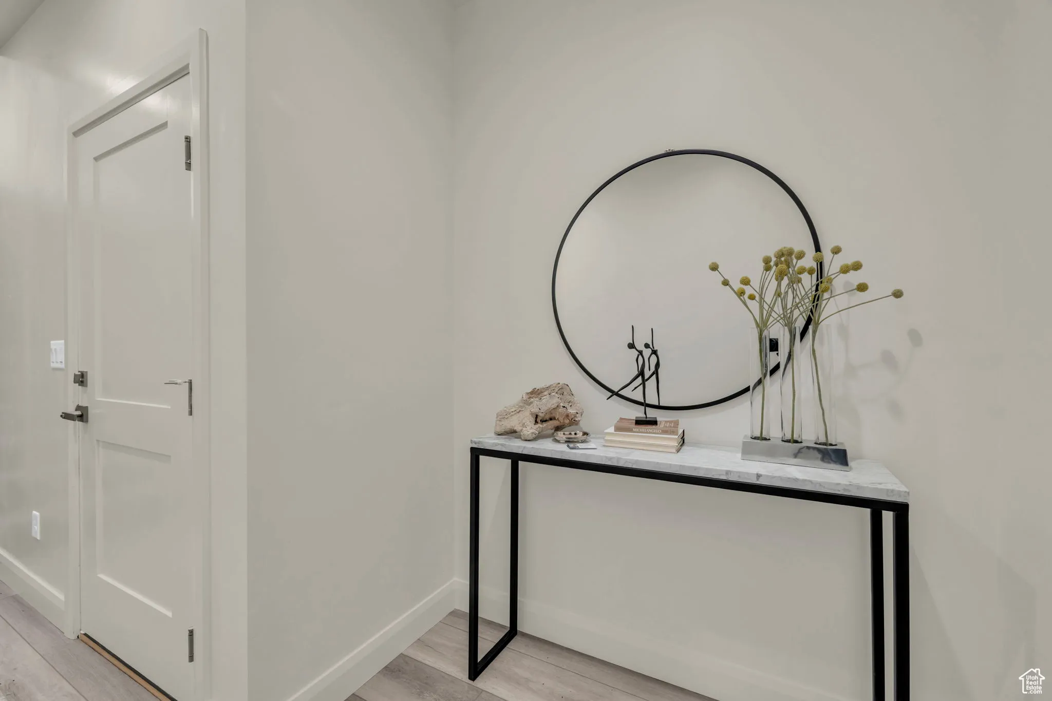 Detailed view of wood finished floors and baseboards