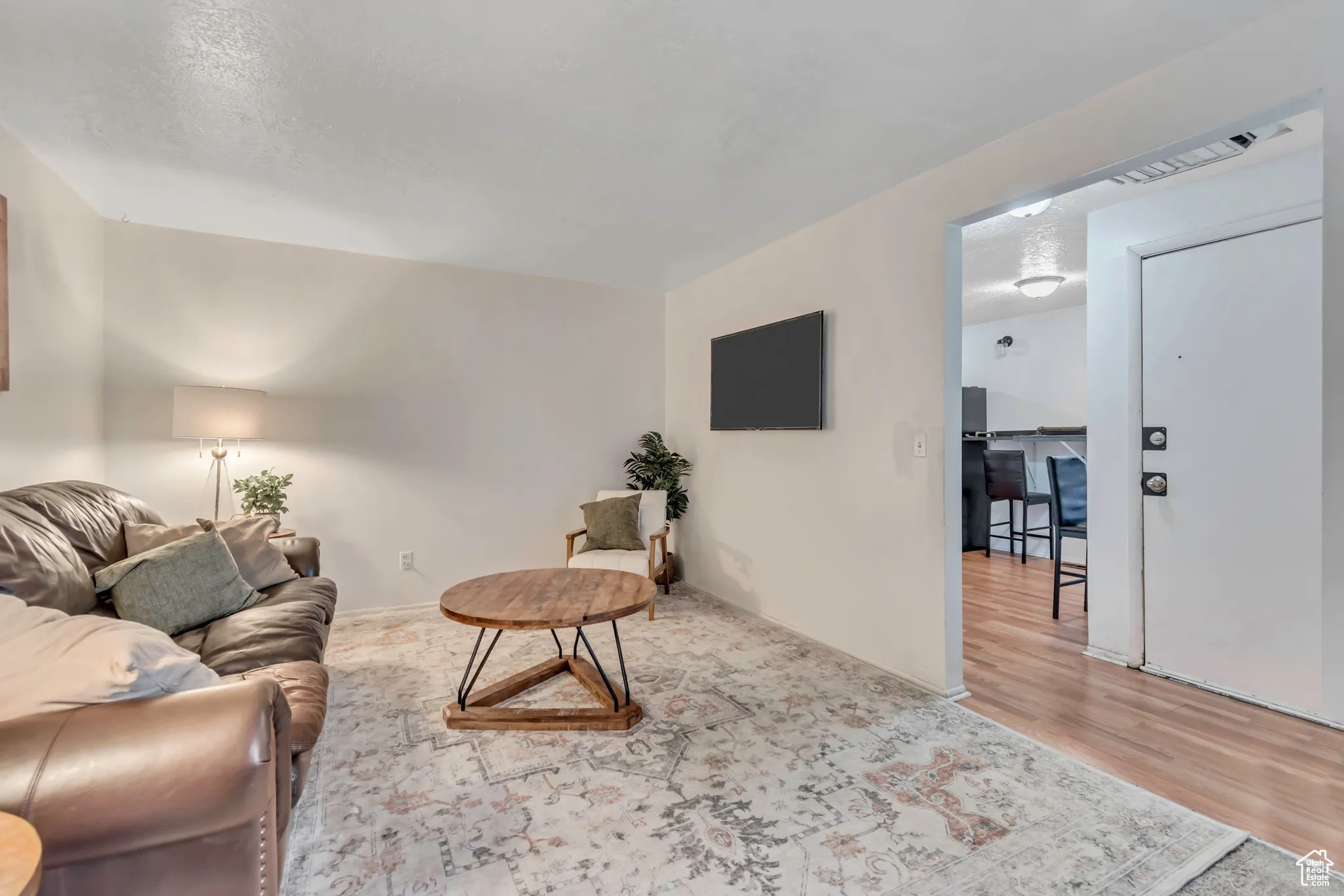 Living room with light wood-style floors