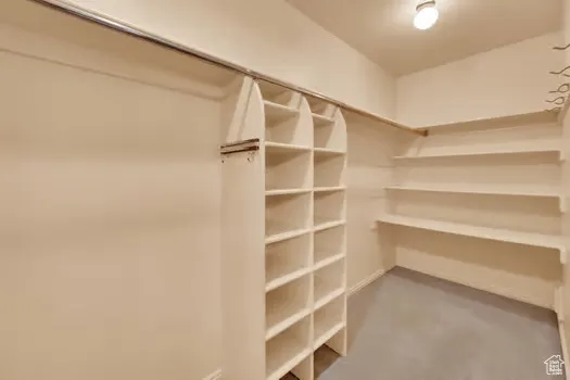 Huge Master Closet with built-in shelving--plenty of room to spread out.