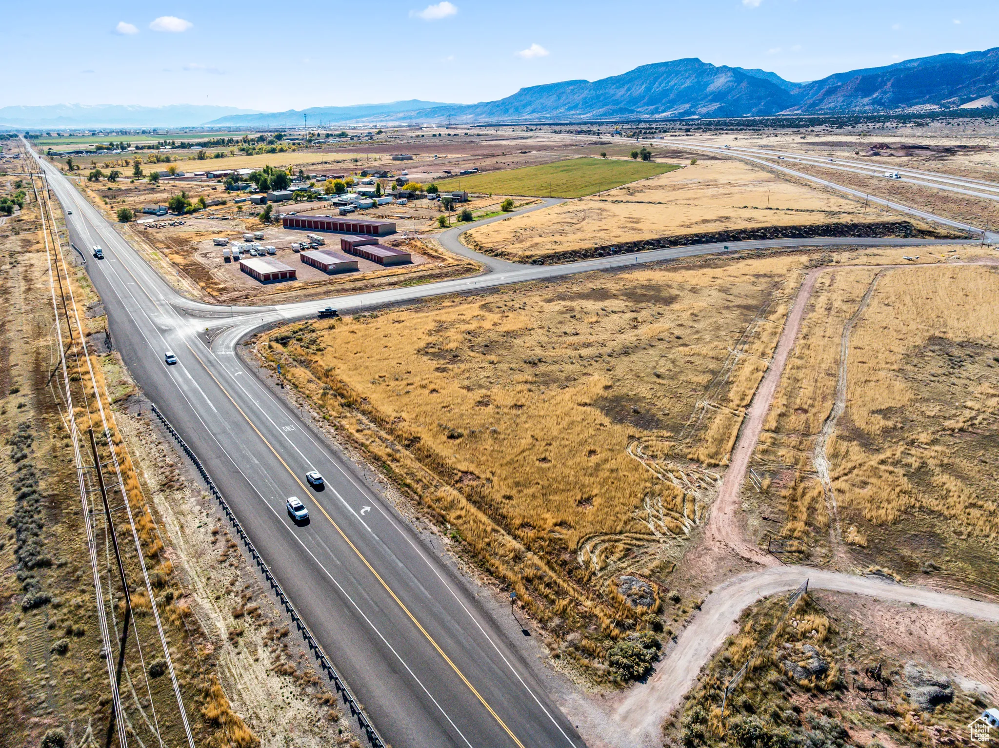 Bird's eye view of a mountainous background and a highway