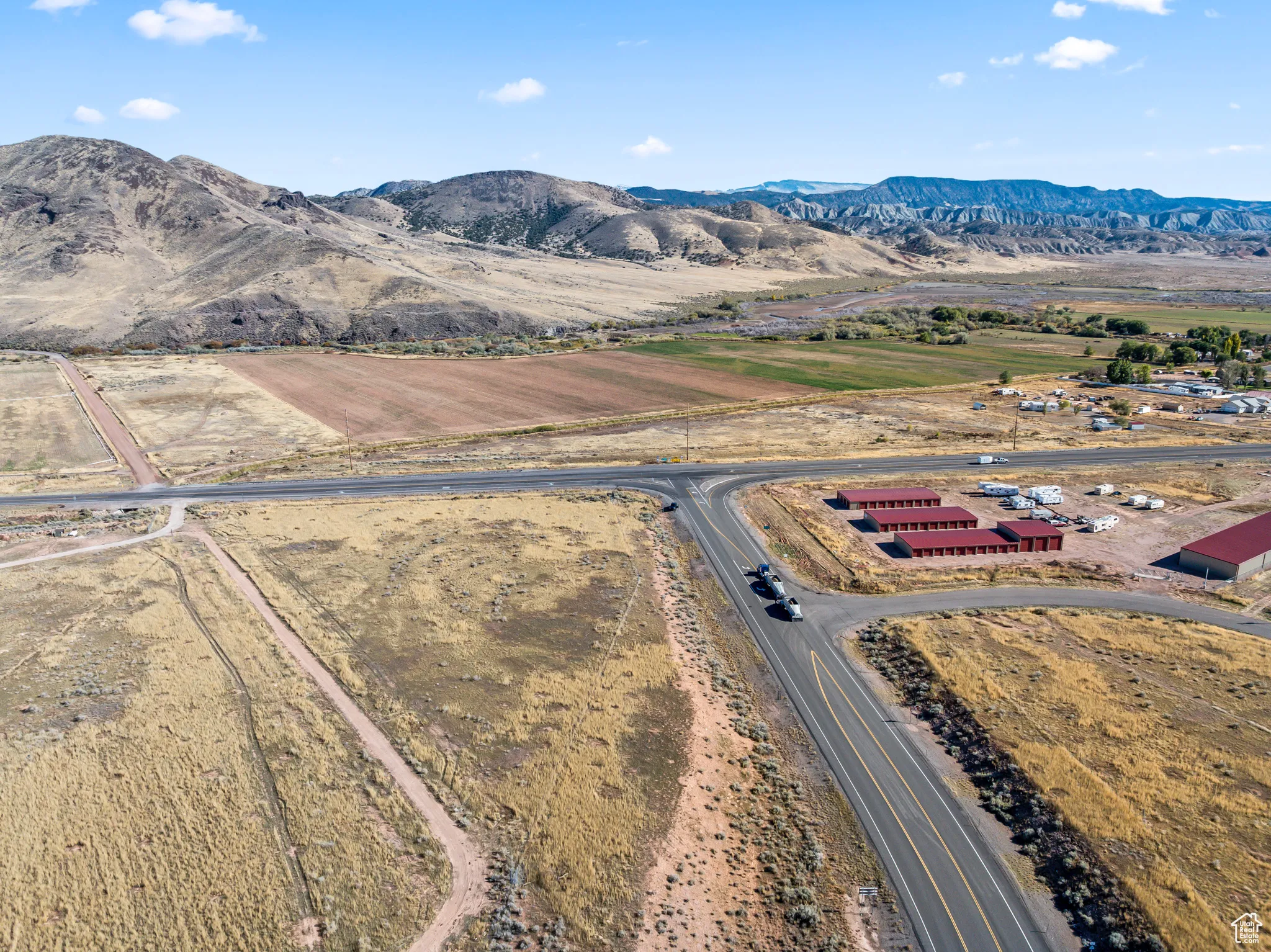Overview of rural landscape with a mountain backdrop