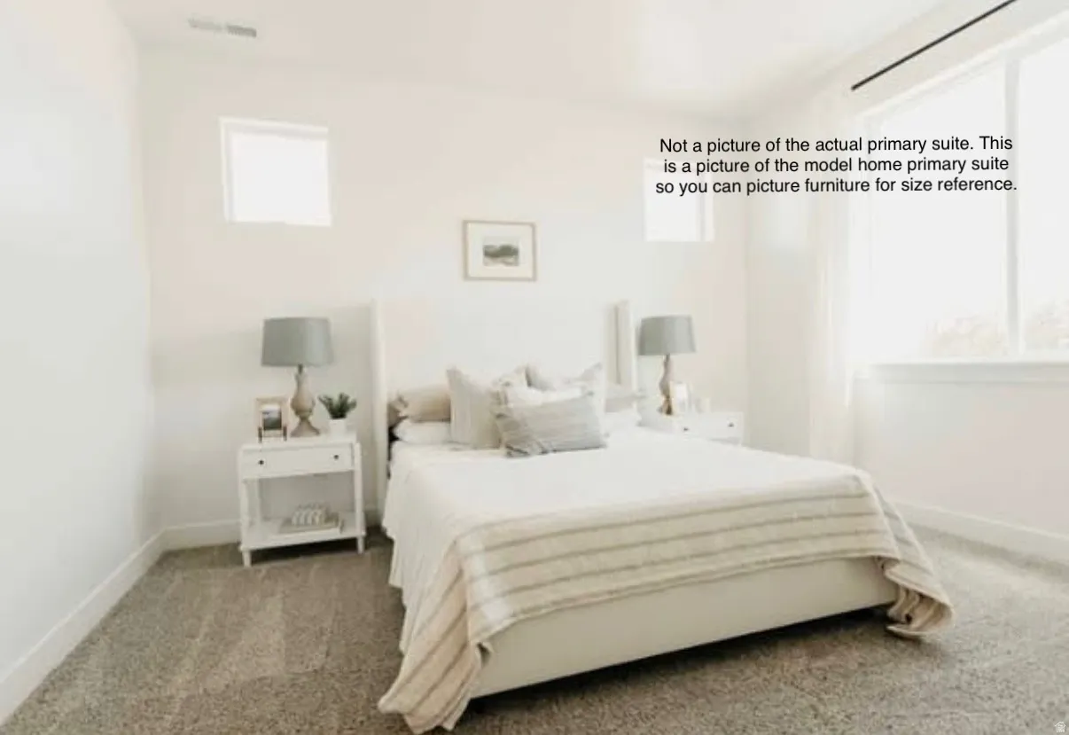 Primary bedroom of model home.
