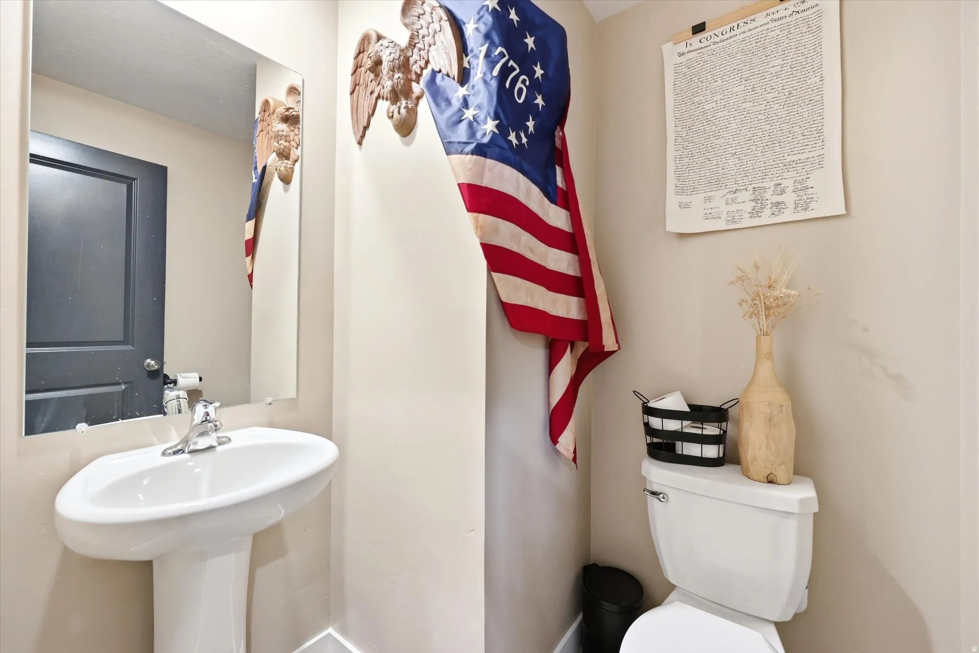 Pedestal sink with a chrome faucet