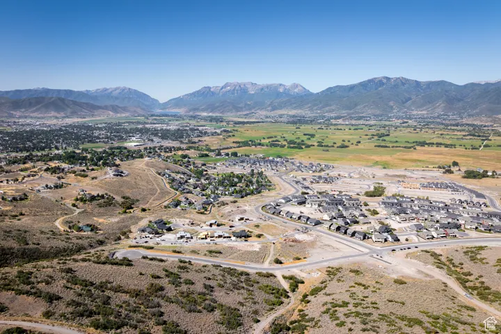 View of mountain background featuring nearby suburban area