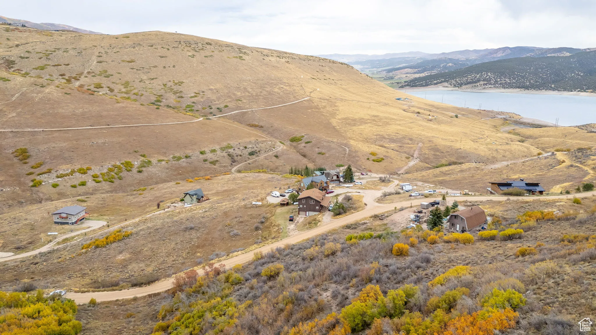 View of property location featuring a water and mountain view