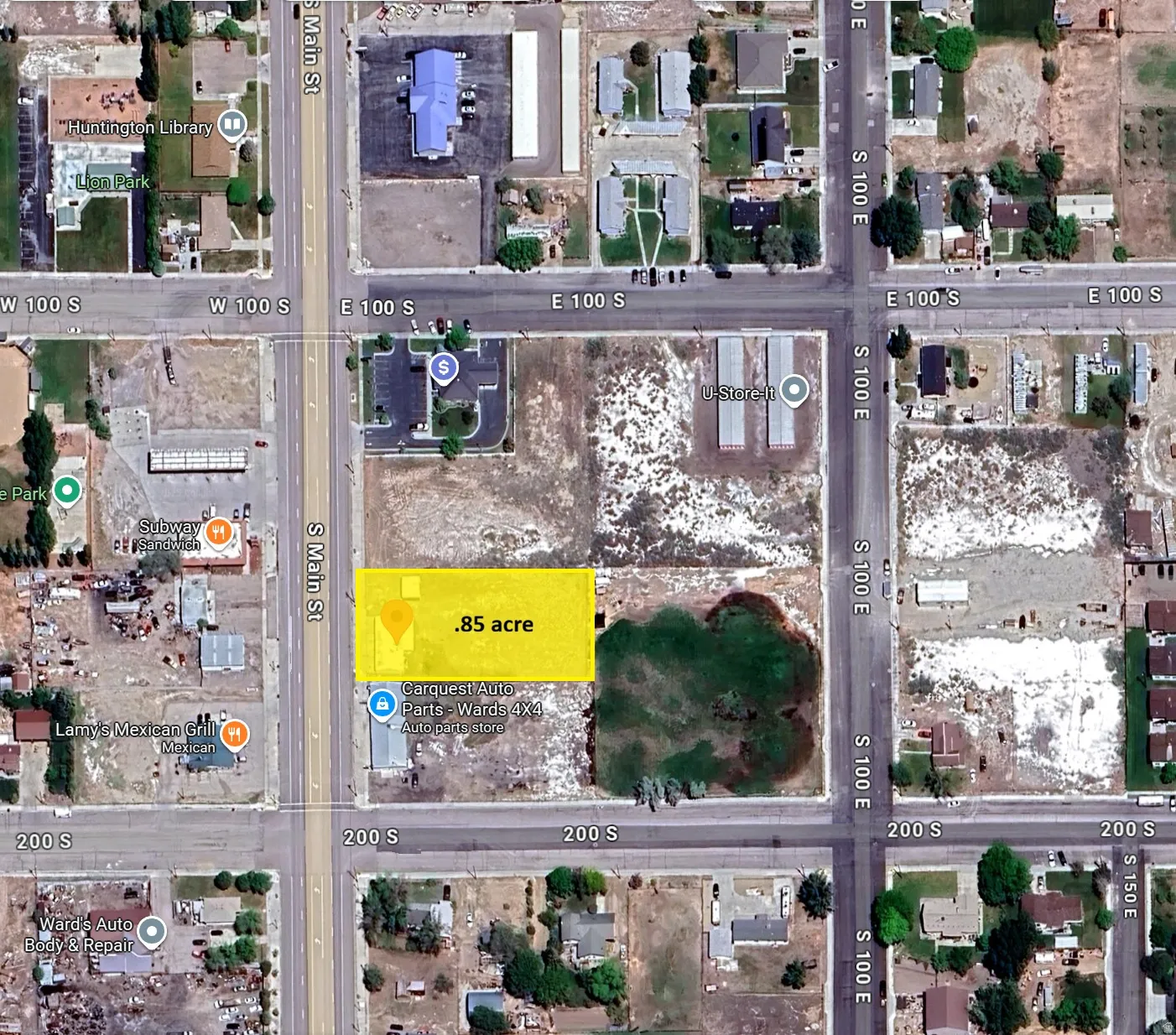 Aerial map of property and surrounding area with property parcel outlined
