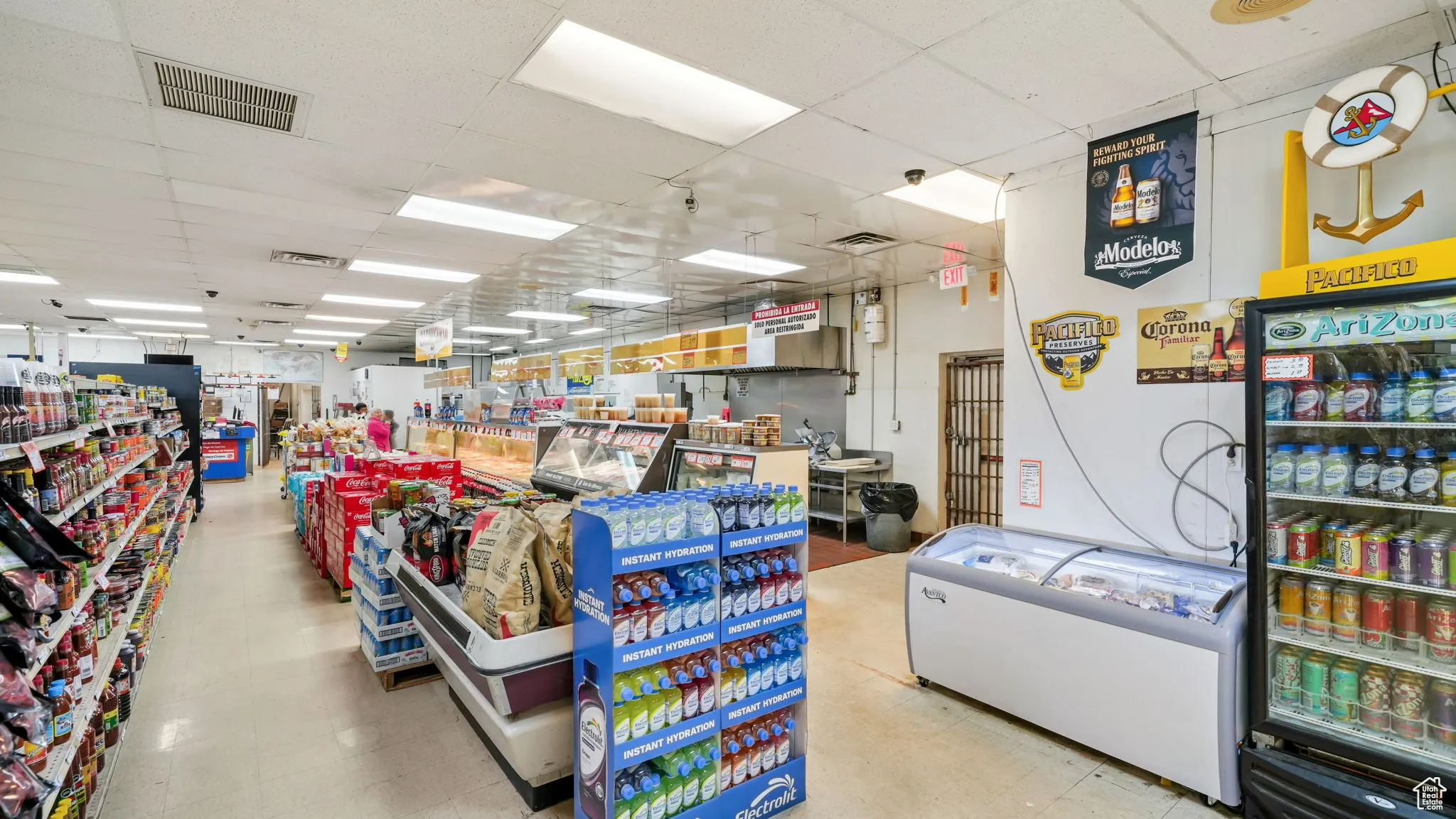 Misc room with a paneled ceiling