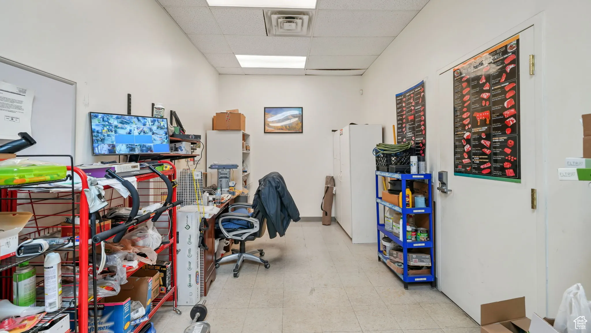 Home office with a drop ceiling