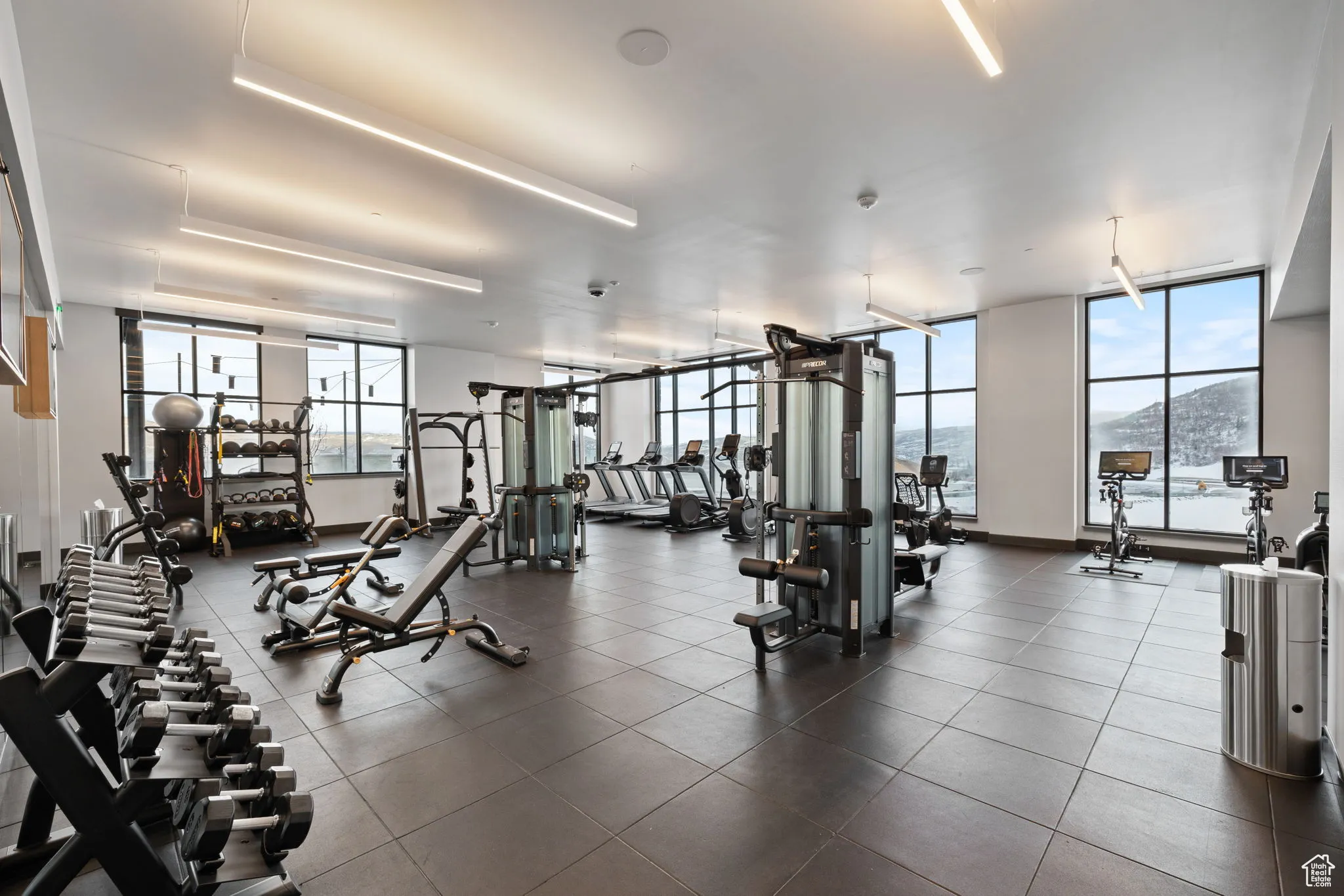 Gym featuring expansive windows