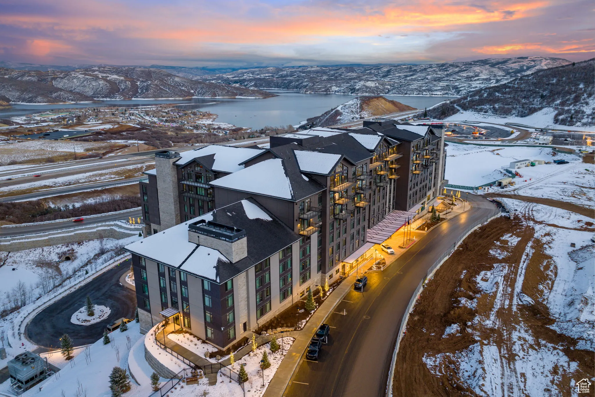 Snowy aerial view featuring a mountain view