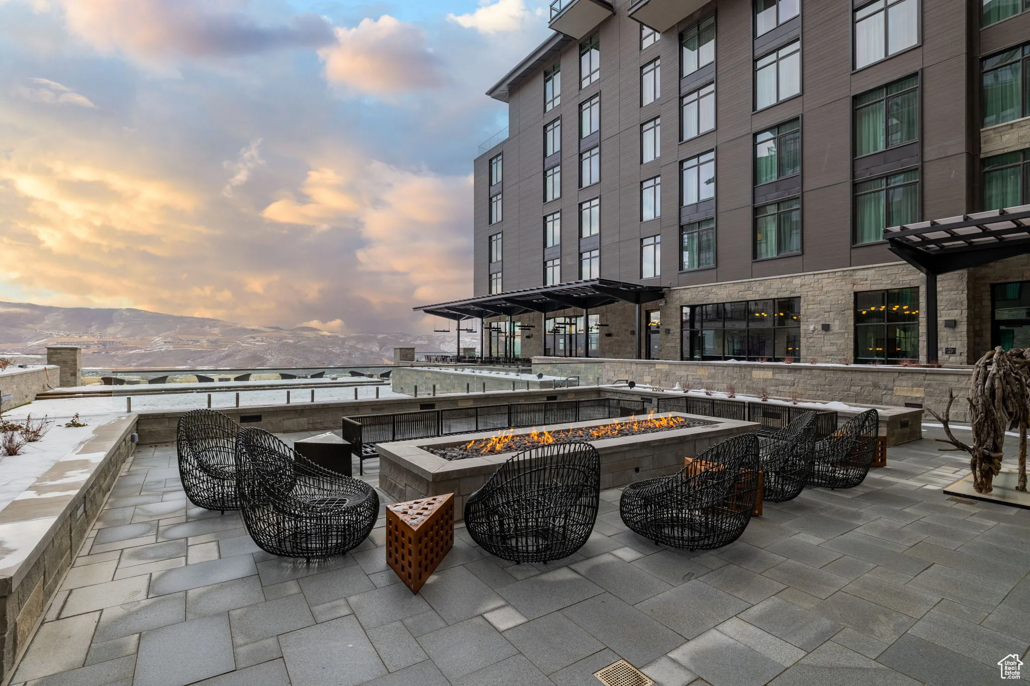 View of patio featuring a mountain view and a fire pit