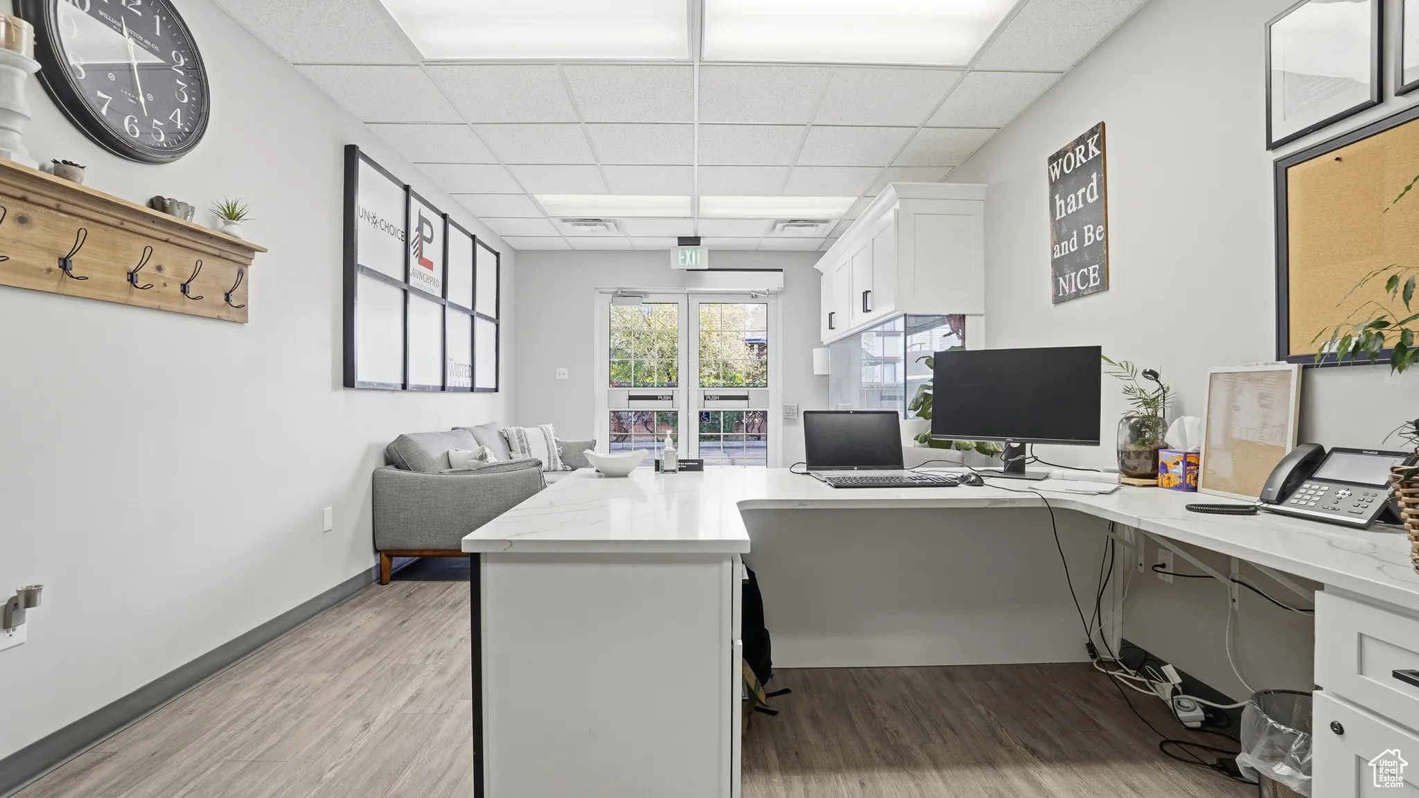 Home office with a drop ceiling