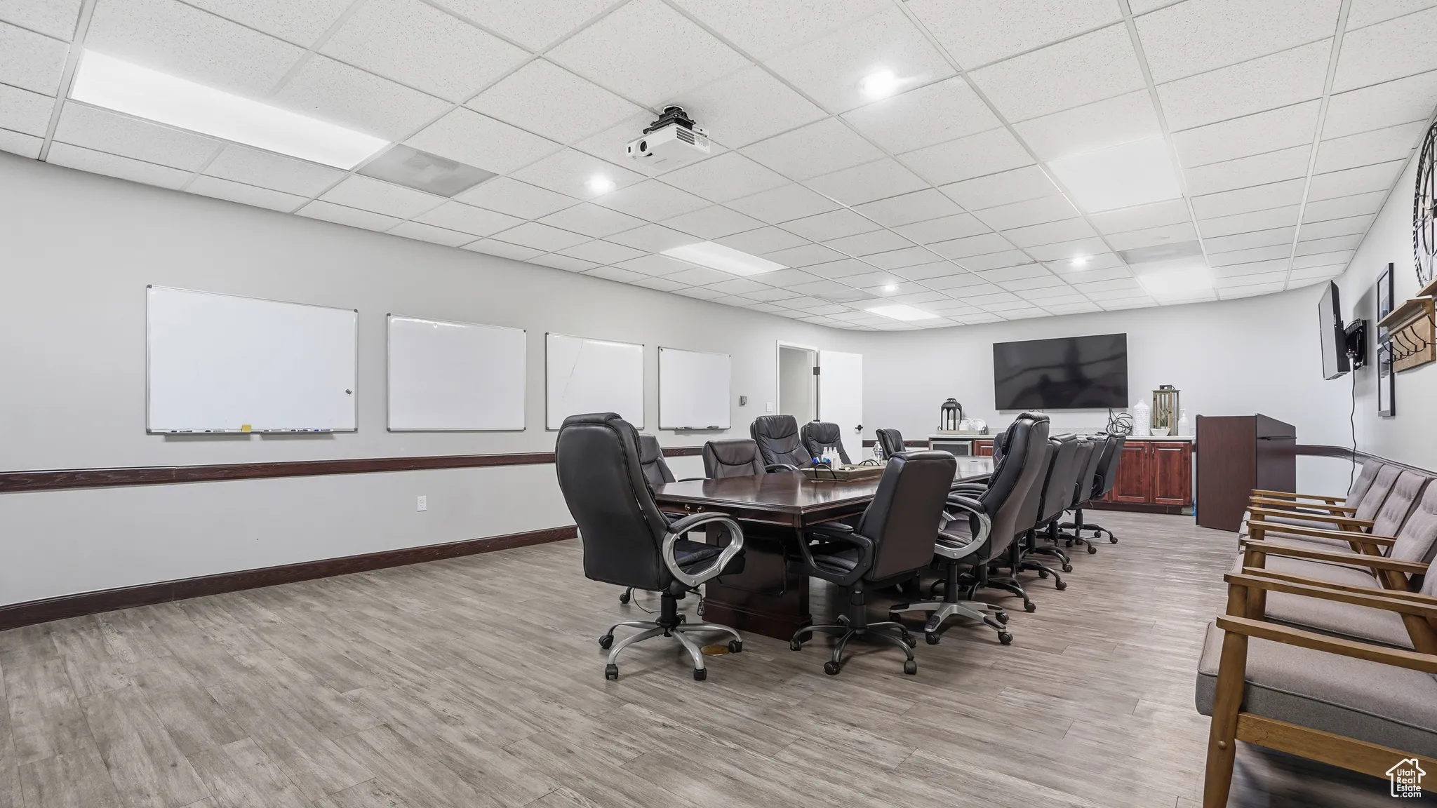 Office space featuring a drop ceiling