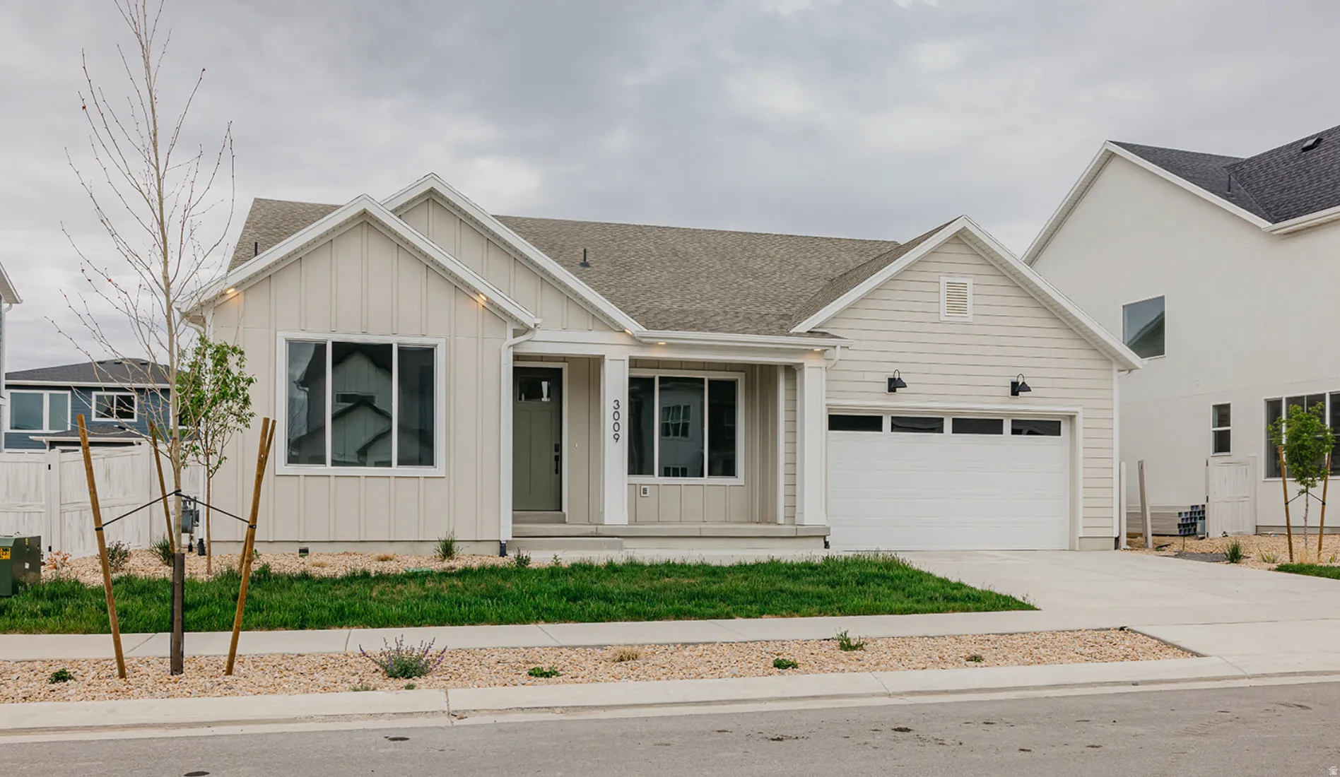 Contemporary home exterior featuring board and batten siding and horizontal paneling