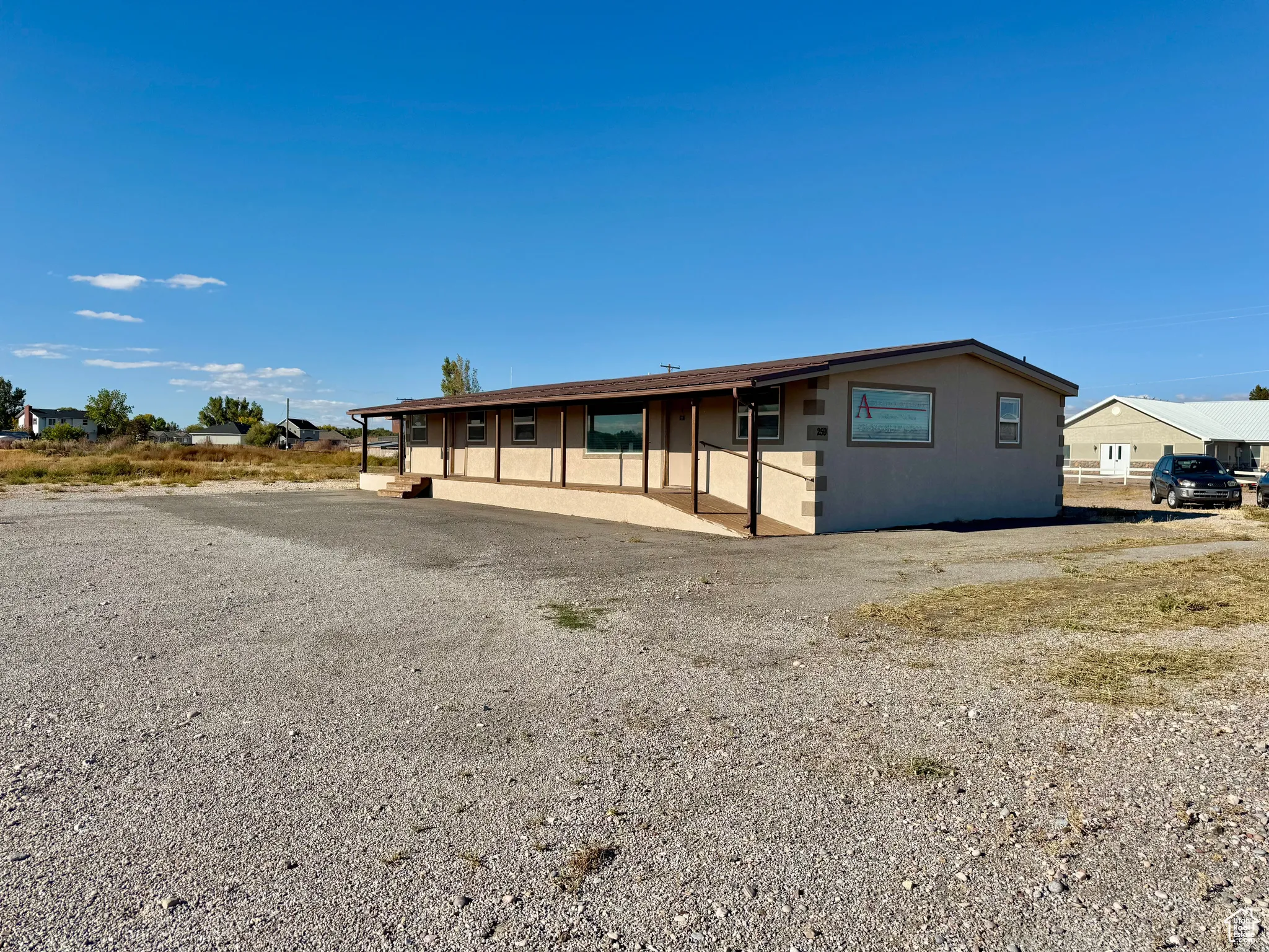 View of front of home featuring stucco siding