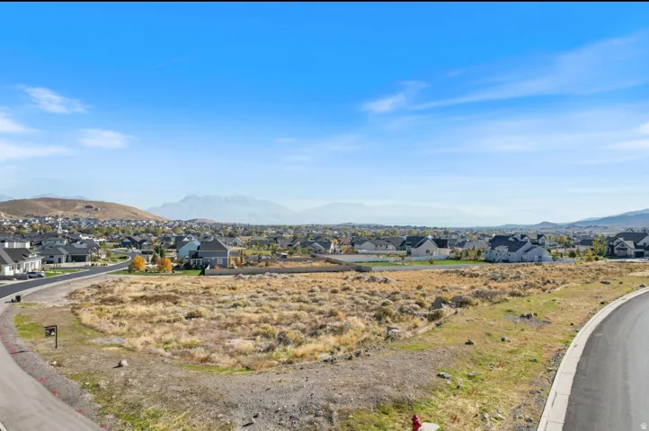 Mountain view featuring nearby suburban area