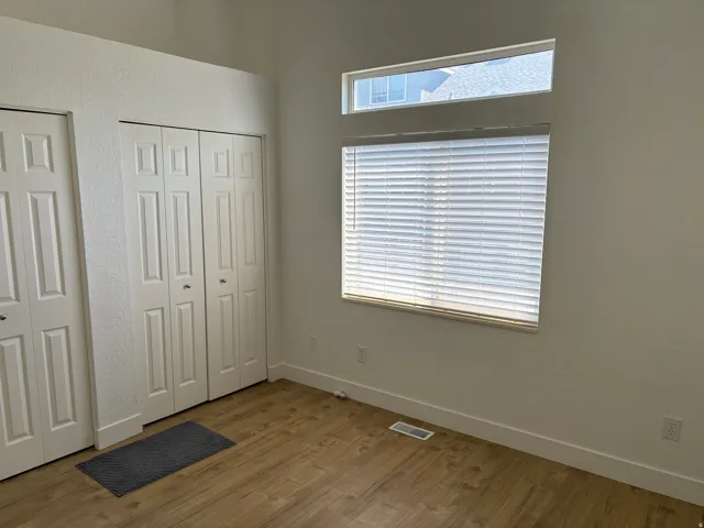 Bedroom #1 with double closets and access to main bathroom.