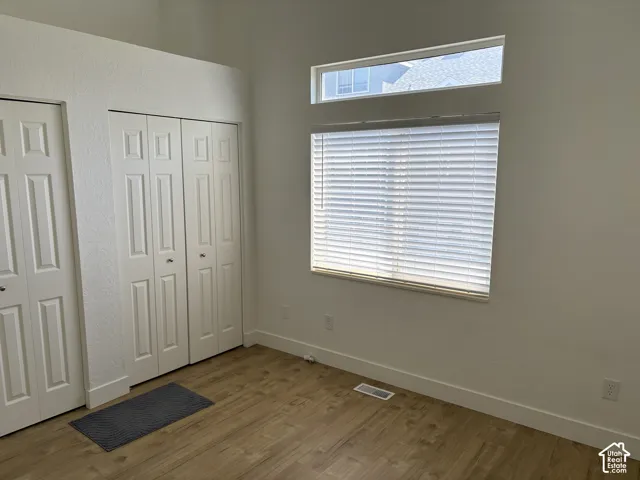 Bedroom #1 with double closets and access to main bathroom.