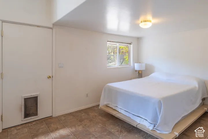 Bedroom featuring baseboards