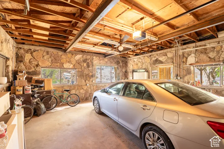 Garage featuring a garage door opener