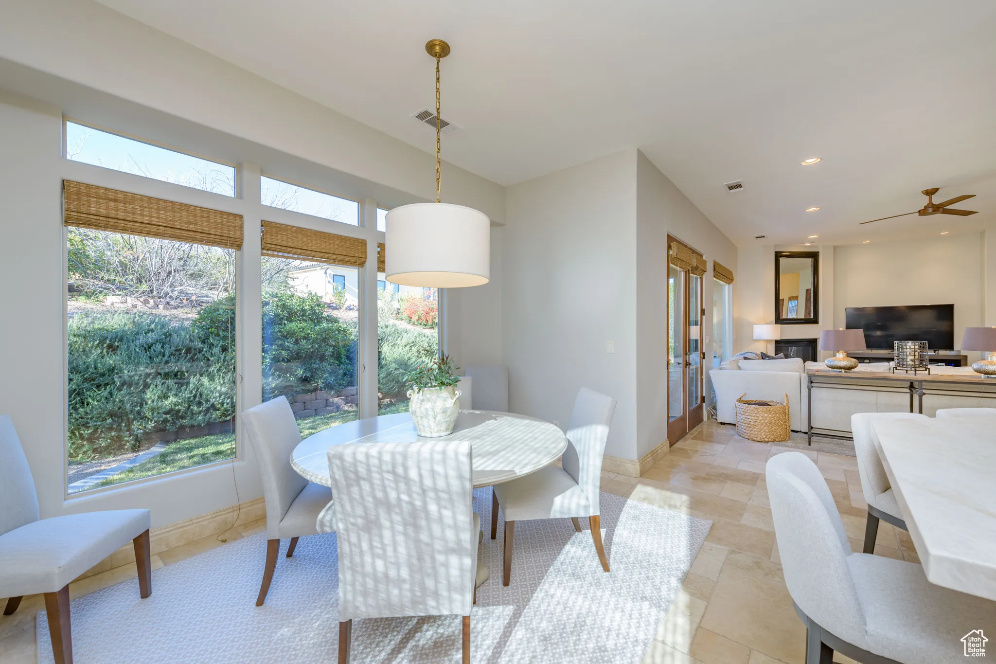 Dining room featuring recessed lighting and a ceiling fan