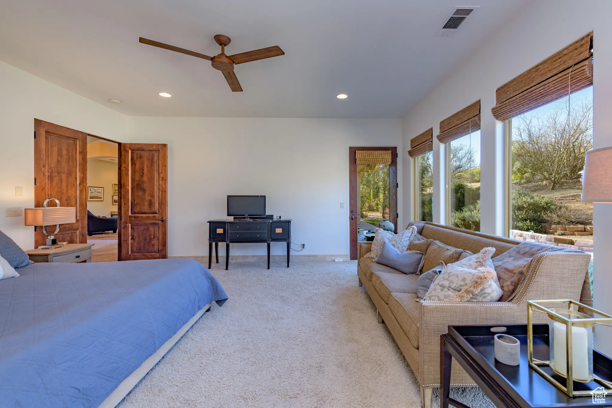 Bedroom with recessed lighting, carpet flooring, access to exterior, and ceiling fan