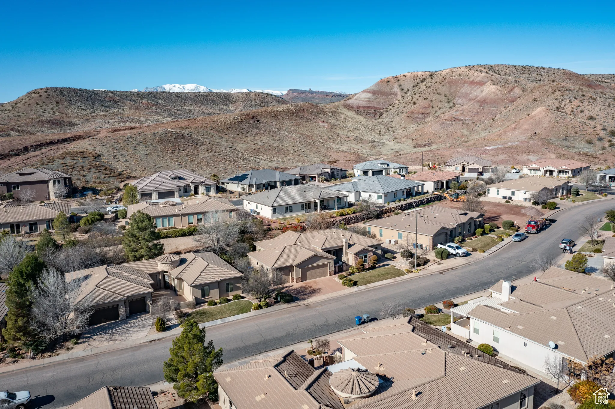 Aerial perspective of suburban area featuring mountains