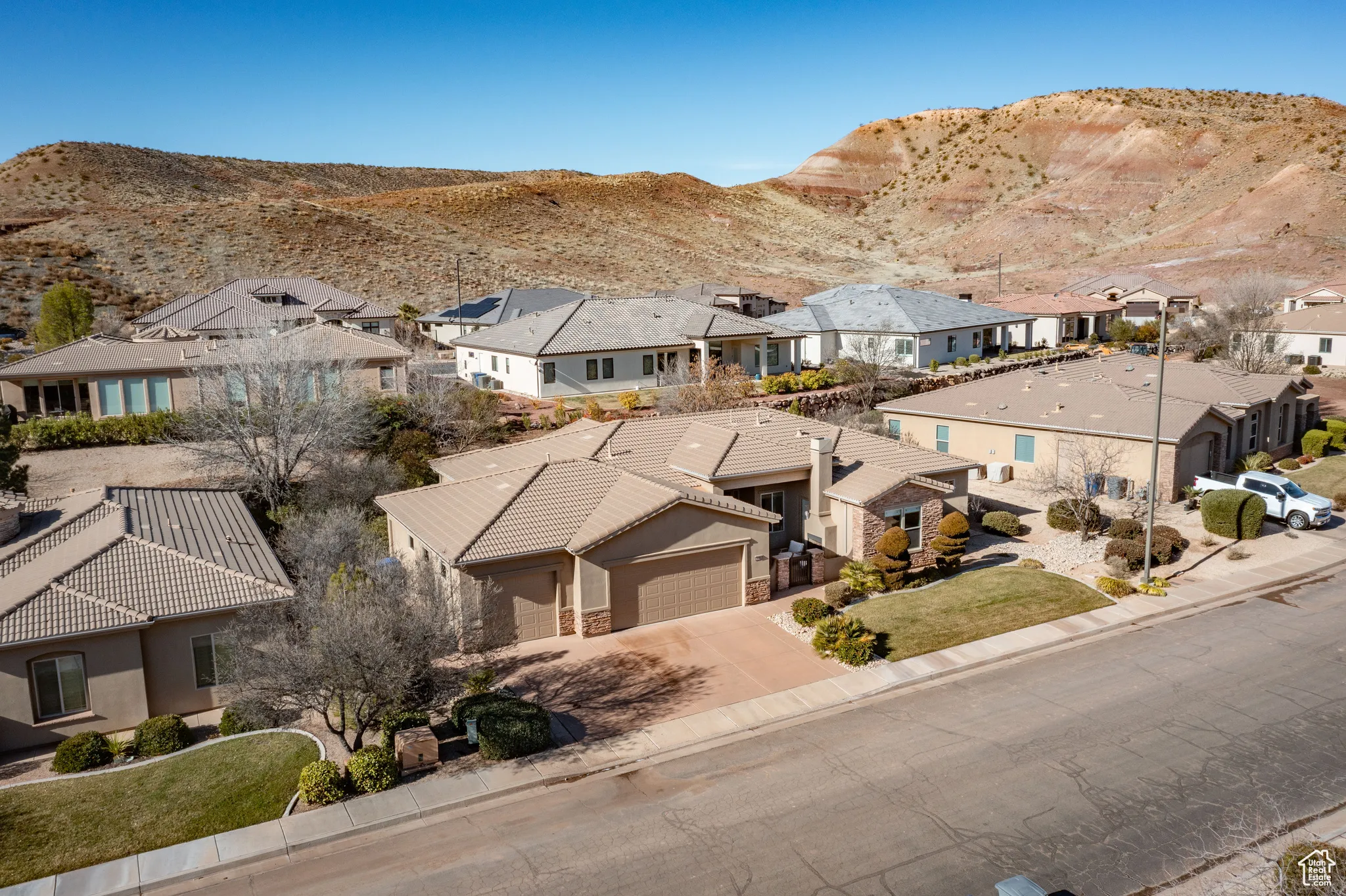 Aerial view of residential area featuring mountains