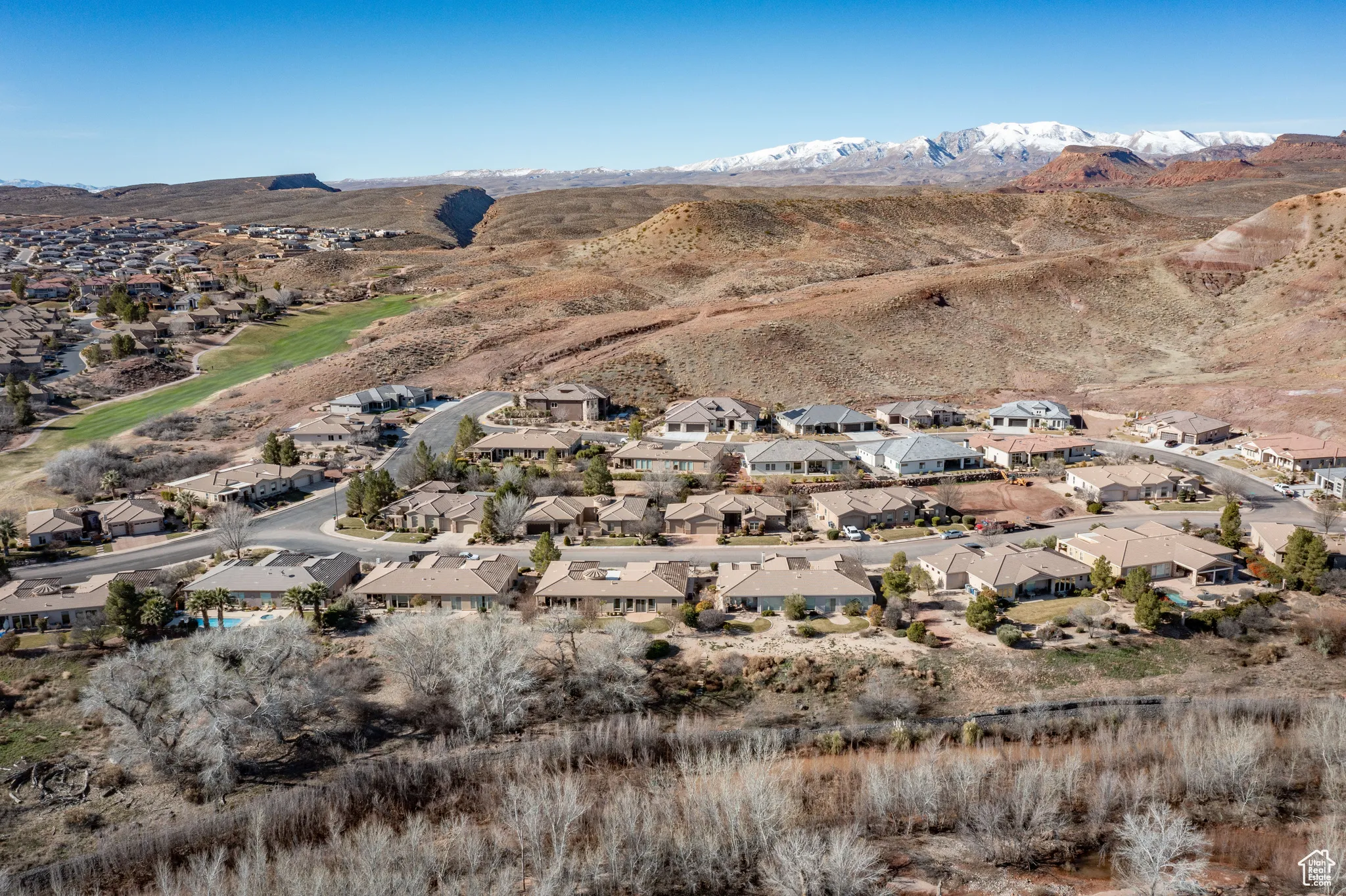 View of mountain background featuring nearby suburban area