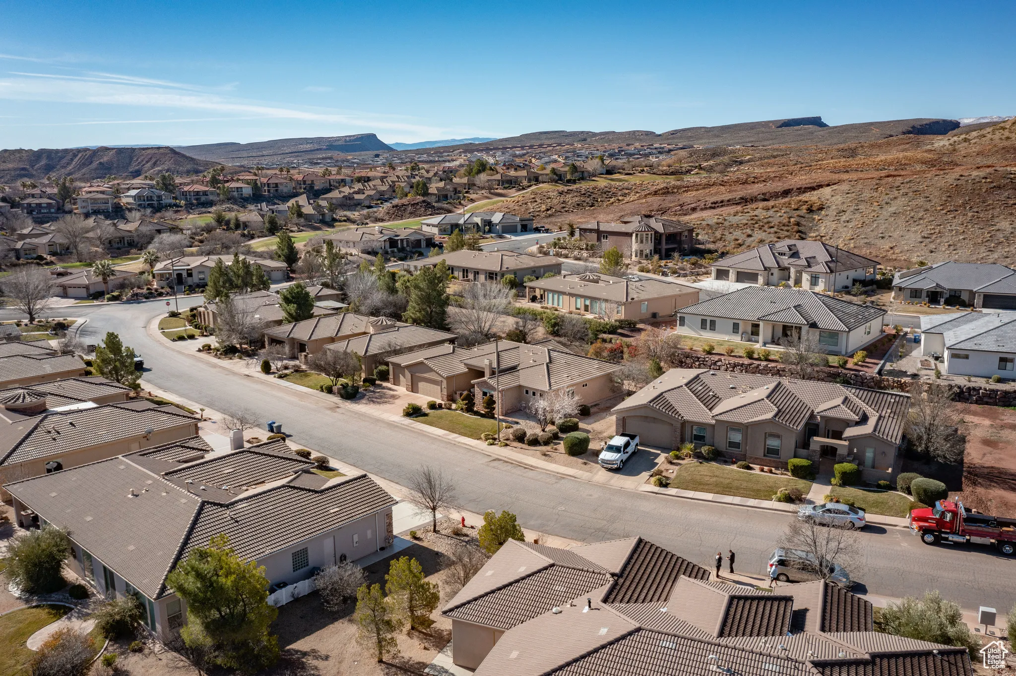 Aerial view of residential area with a mountain backdrop
