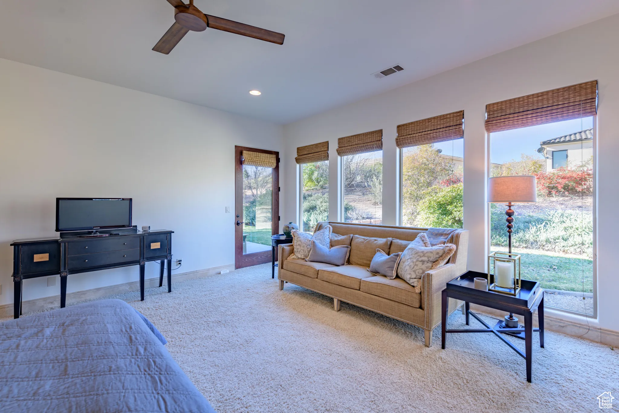 Bedroom featuring access to exterior, carpet, recessed lighting, and a ceiling fan