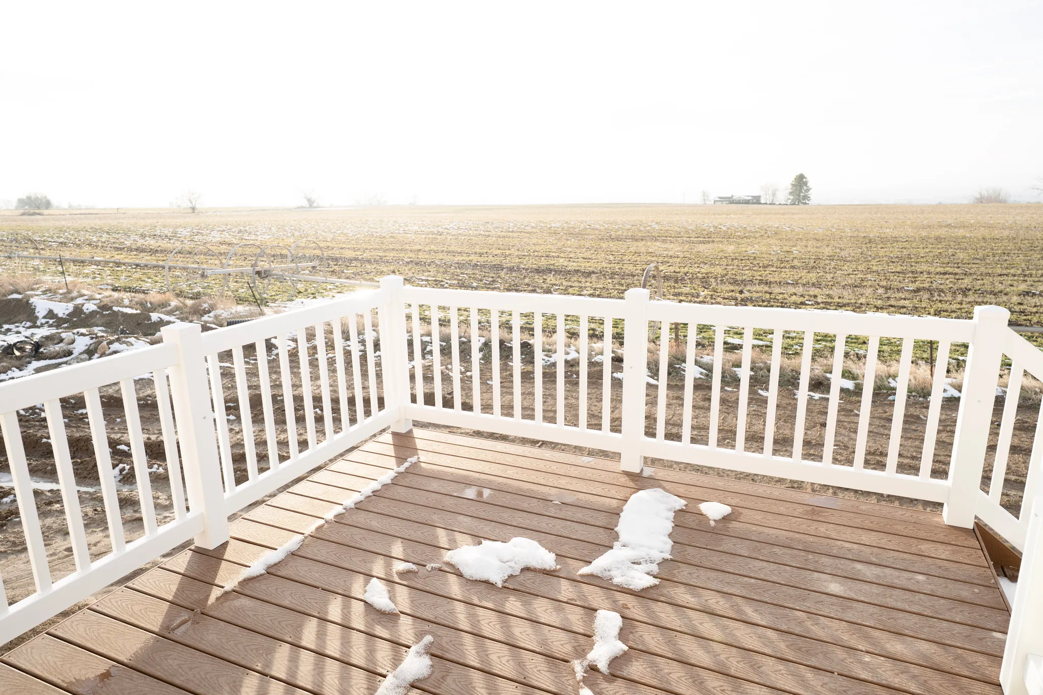 Wooden deck featuring a rural view