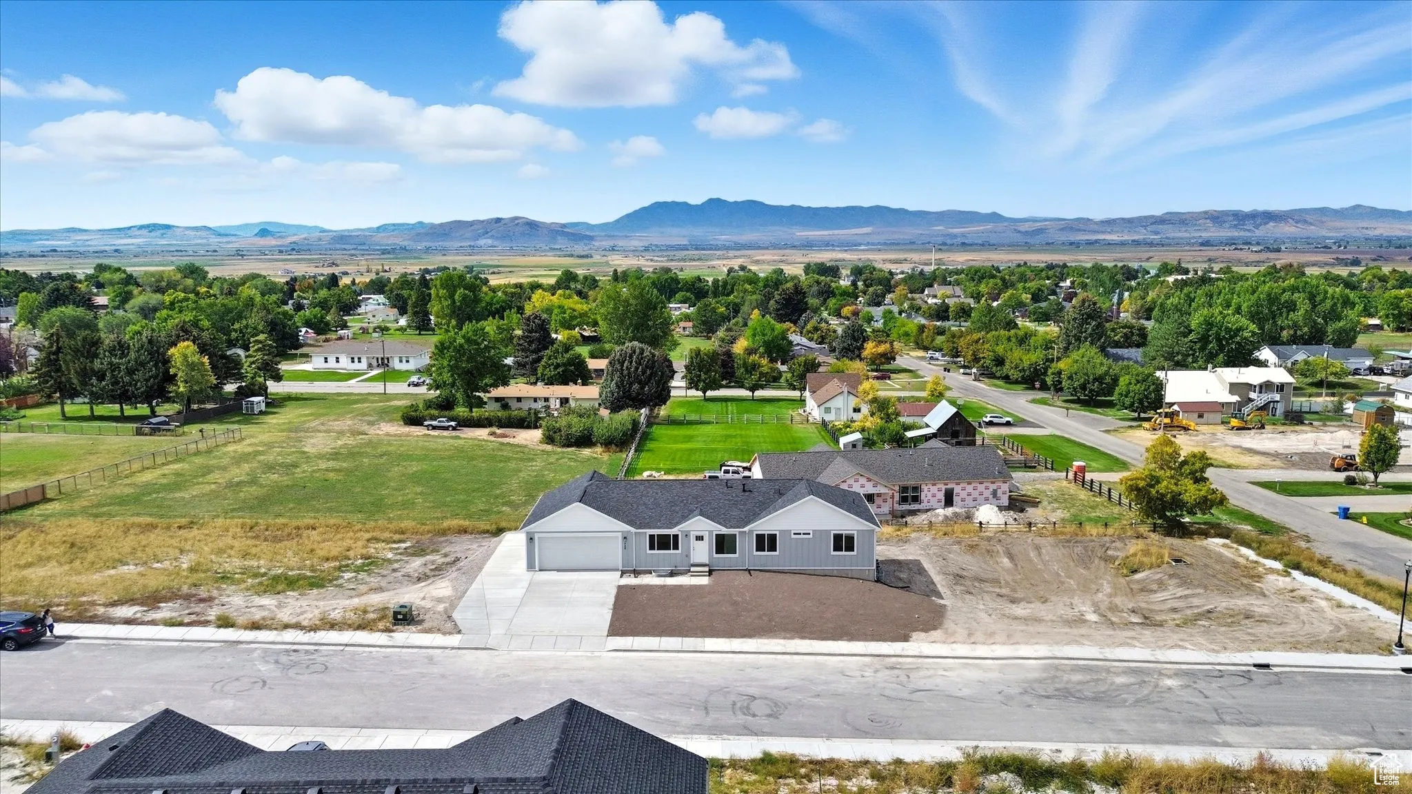 Aerial view of residential area with a mountainous background