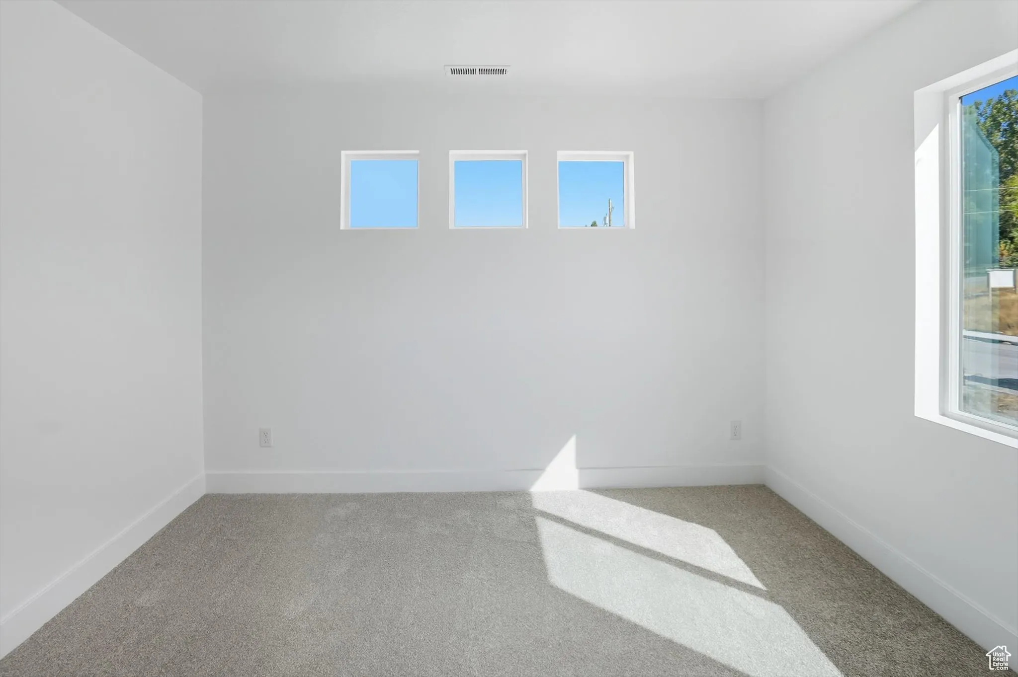 Spare room with carpet