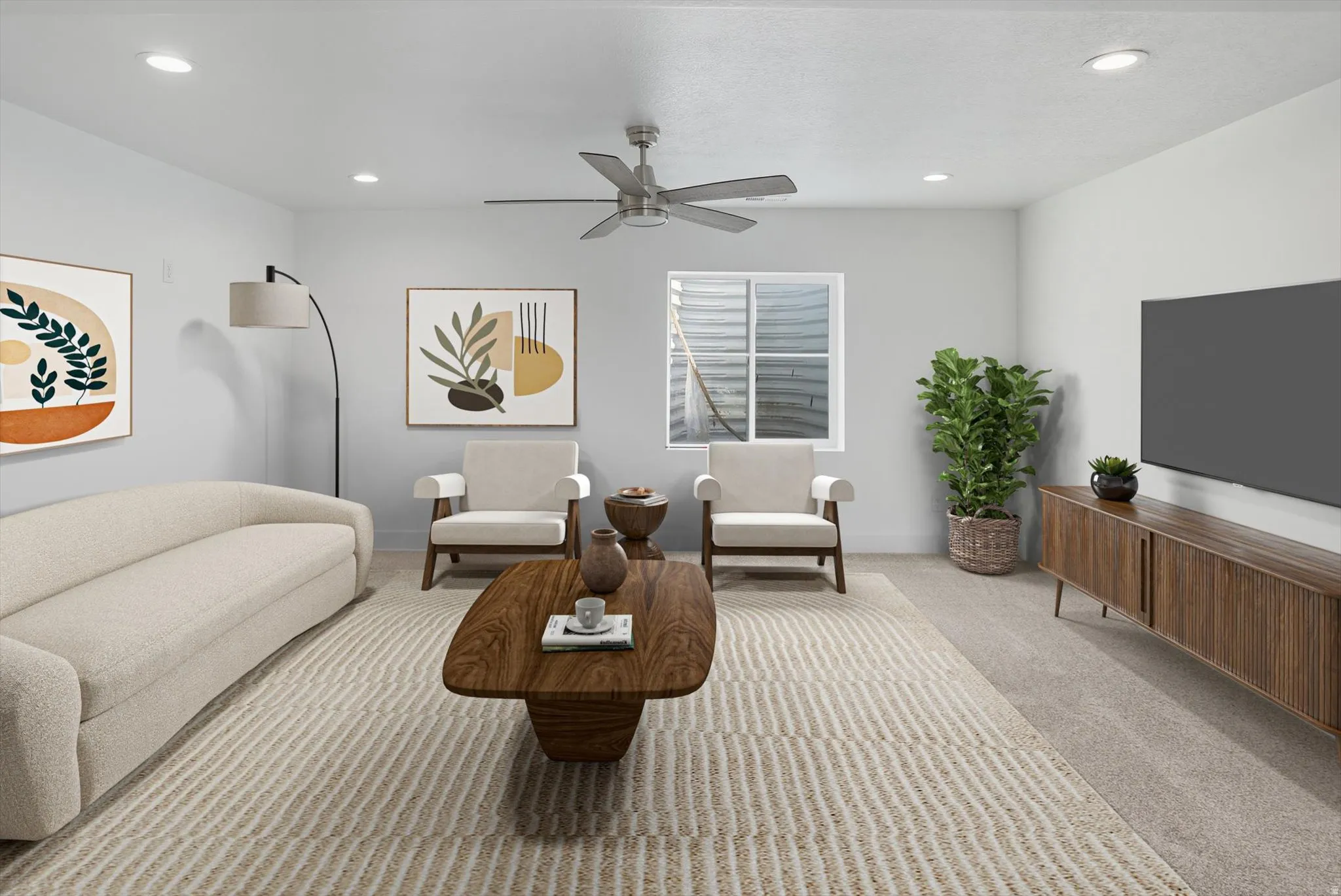 Living room featuring light carpet, ceiling fan, and recessed lighting